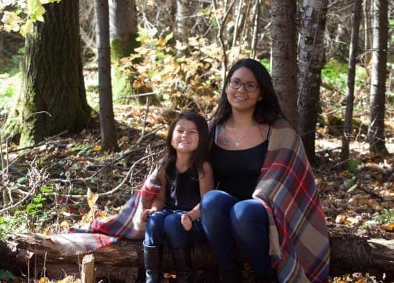 An indigenious woman and her daughter
